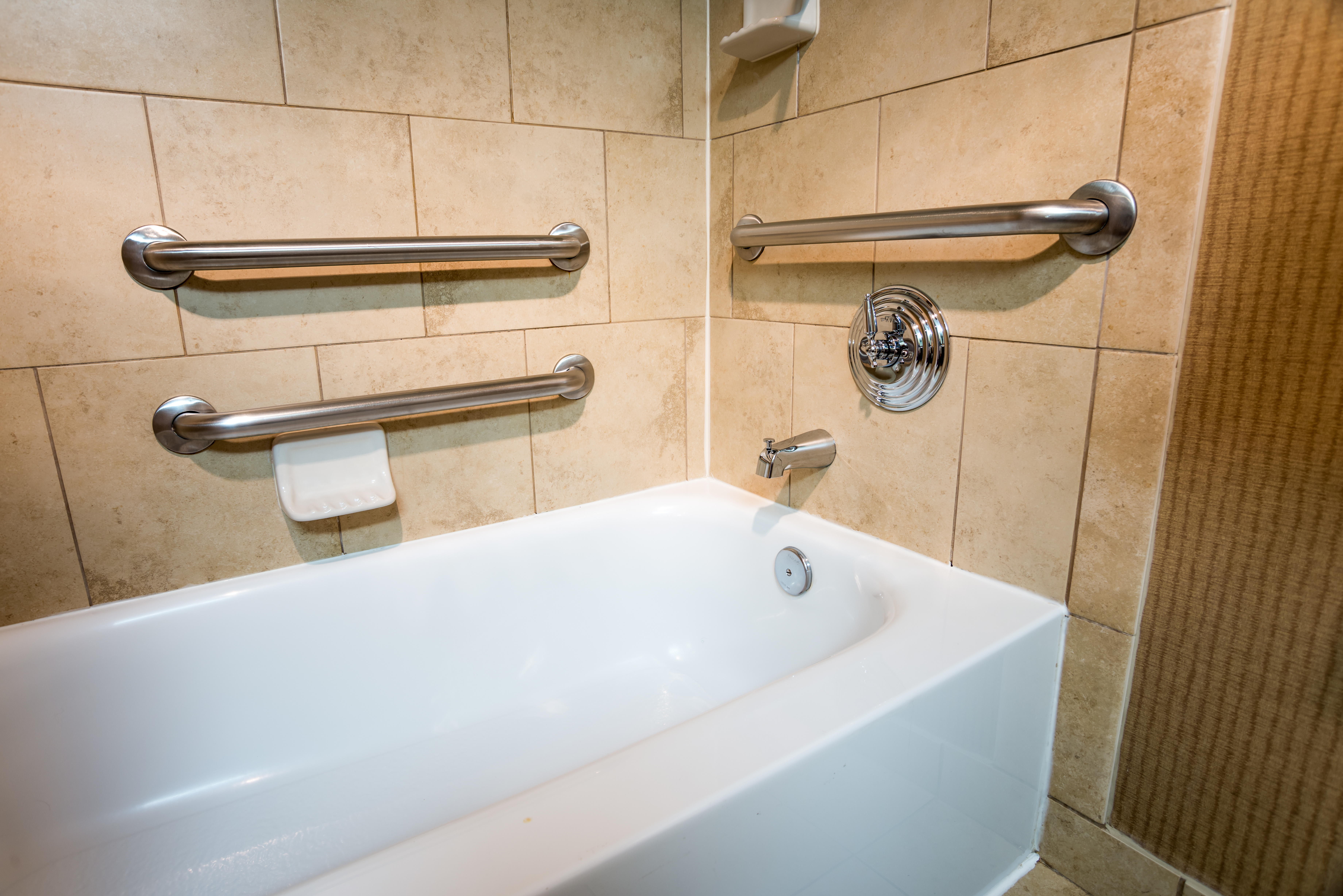 Shower-tub combo with safety bars