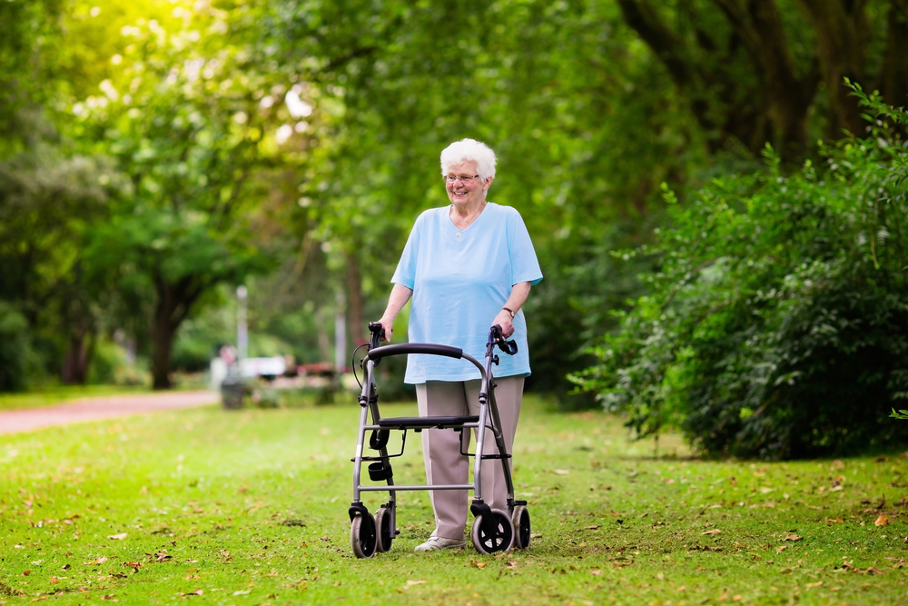 Senior woman with wheeled walker